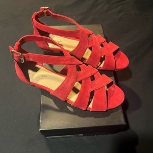 Red suede sandals.